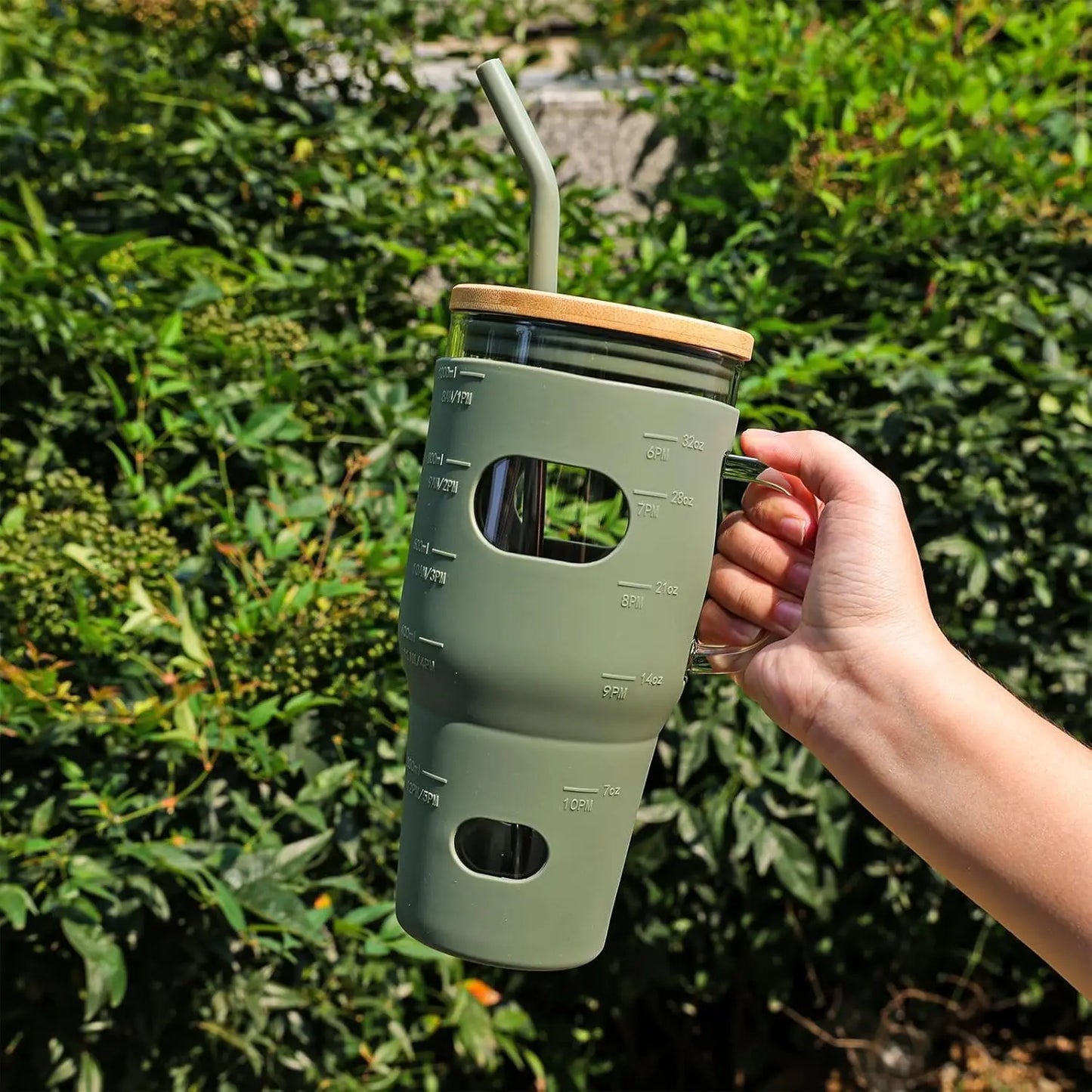 32oz glass water bottle, glass drum with lid and straw, glass iced coffee cup with time marker and silicone cover, reusable