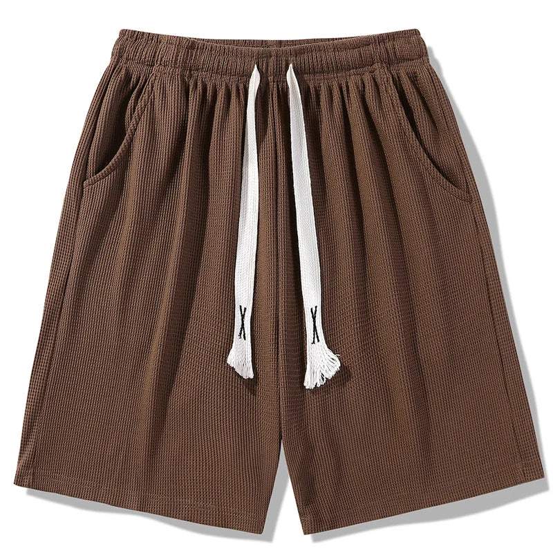 Sports shorts for men in summer thin ice silk quick drying five quarter pants fashionable waffle style drawstring shorts