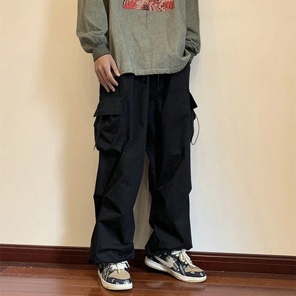 Streetwear 2023 Spring Harem Casual Pants Men Elastic Waist Solid Color Cargo Pants Multi Pocket Loose Baggy Pants For Women