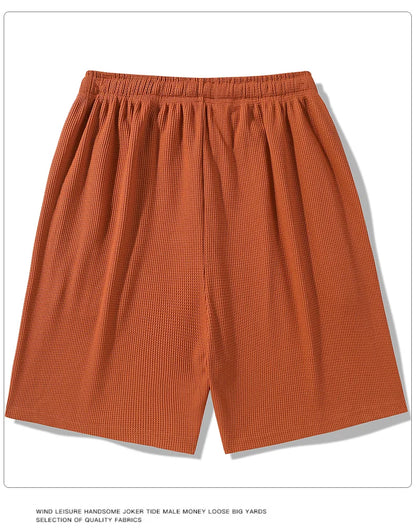 Sports shorts for men in summer  thin ice silk quick drying five quarter pants  fashionable waffle style drawstring shorts