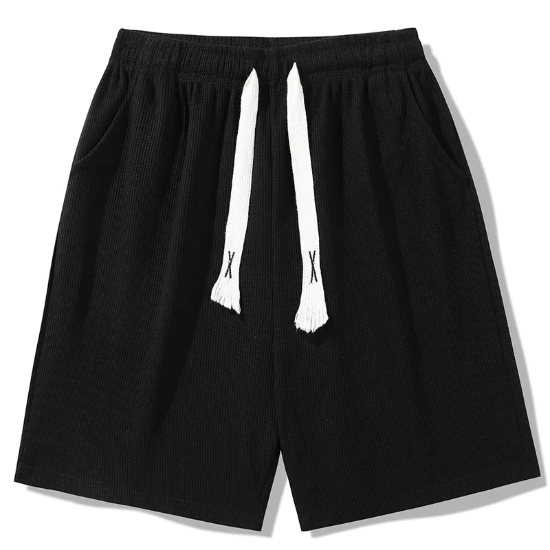 Sports shorts for men in summer  thin ice silk quick drying five quarter pants  fashionable waffle style drawstring shorts