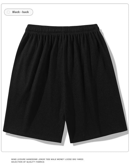 Sports shorts for men in summer  thin ice silk quick drying five quarter pants  fashionable waffle style drawstring shorts