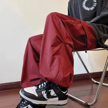 Streetwear 2023 Spring Harem Casual Pants Men Elastic Waist Solid Color Cargo Pants Multi Pocket Loose Baggy Pants For Women