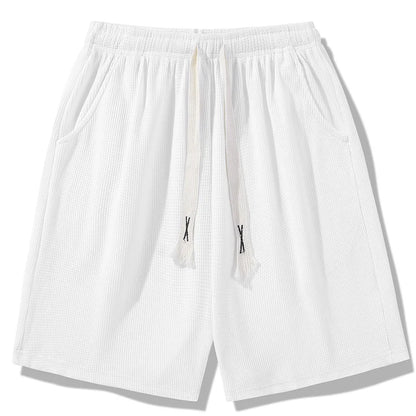 Sports shorts for men in summer  thin ice silk quick drying five quarter pants  fashionable waffle style drawstring shorts