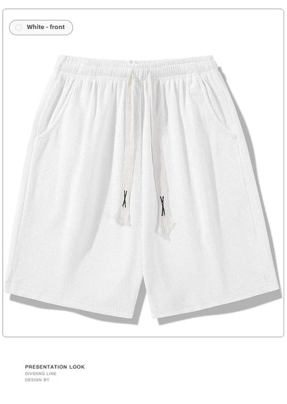 Sports shorts for men in summer  thin ice silk quick drying five quarter pants  fashionable waffle style drawstring shorts