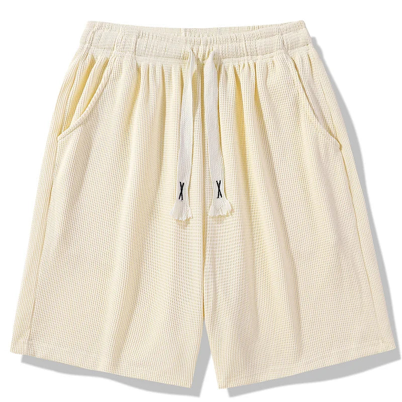 Sports shorts for men in summer  thin ice silk quick drying five quarter pants  fashionable waffle style drawstring shorts