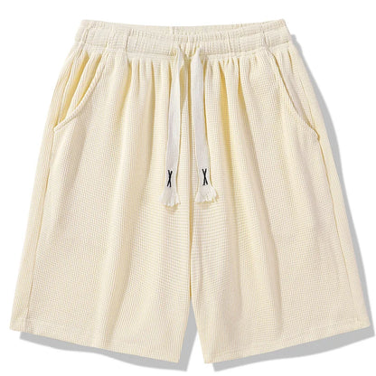 Sports shorts for men in summer  thin ice silk quick drying five quarter pants  fashionable waffle style drawstring shorts