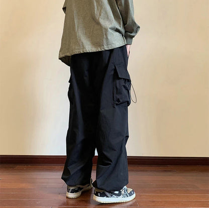 Streetwear 2023 Spring Harem Casual Pants Men Elastic Waist Solid Color Cargo Pants Multi Pocket Loose Baggy Pants For Women